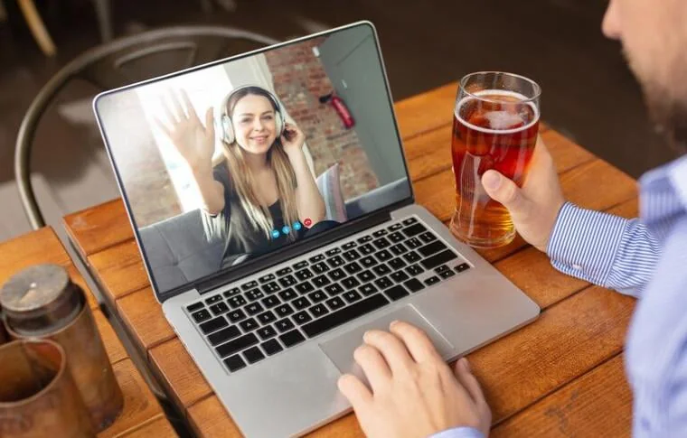 Person using a laptop for a video conversation